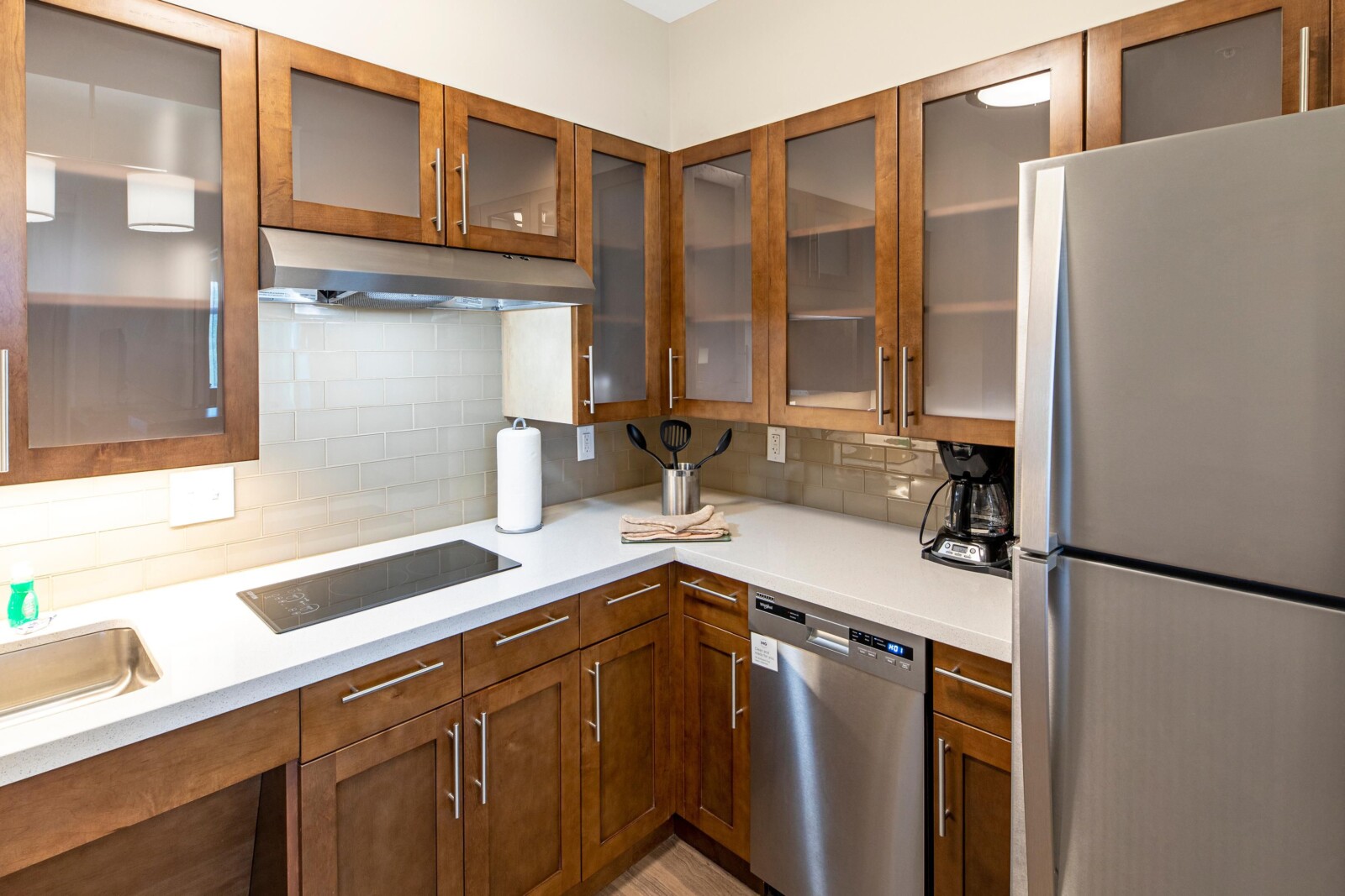 Pictured: Custom Walnut Kitchen Cabinetry